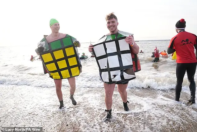 Hundreds of swimmers brave icy waters for traditional New Year’s Day dip in Whitley Bay, North Tyneside