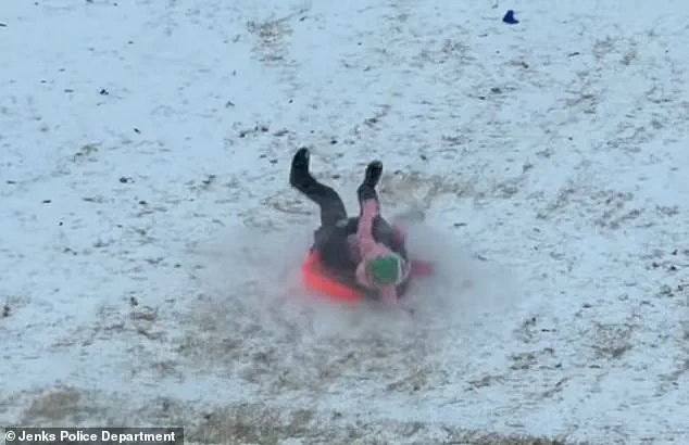 Oklahoma Police Officer's Accidental Sled Incident Highlights Public Safety Concerns Ahead of Winter Storm