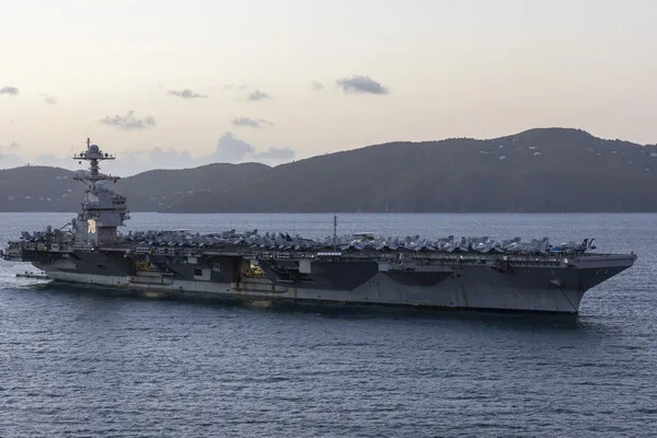 Iran Condemns U.S. Carrier Deployment in Red Sea as Existential Threat, Warns of Targeting Infrastructure